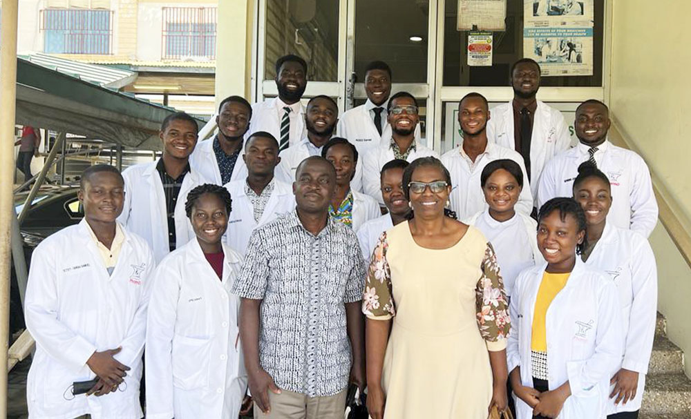 Prof. Anto Berko Panyin (Dean, FPPS) and Dr. Mercy Naa Aduele Opare-Addo with students from Korle Bu Teaching Hospital