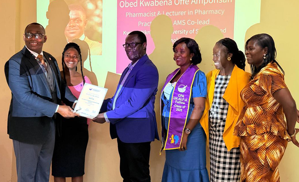 Prof Buabeng recieving a citation on behalf of Dr. Obed Amponsah