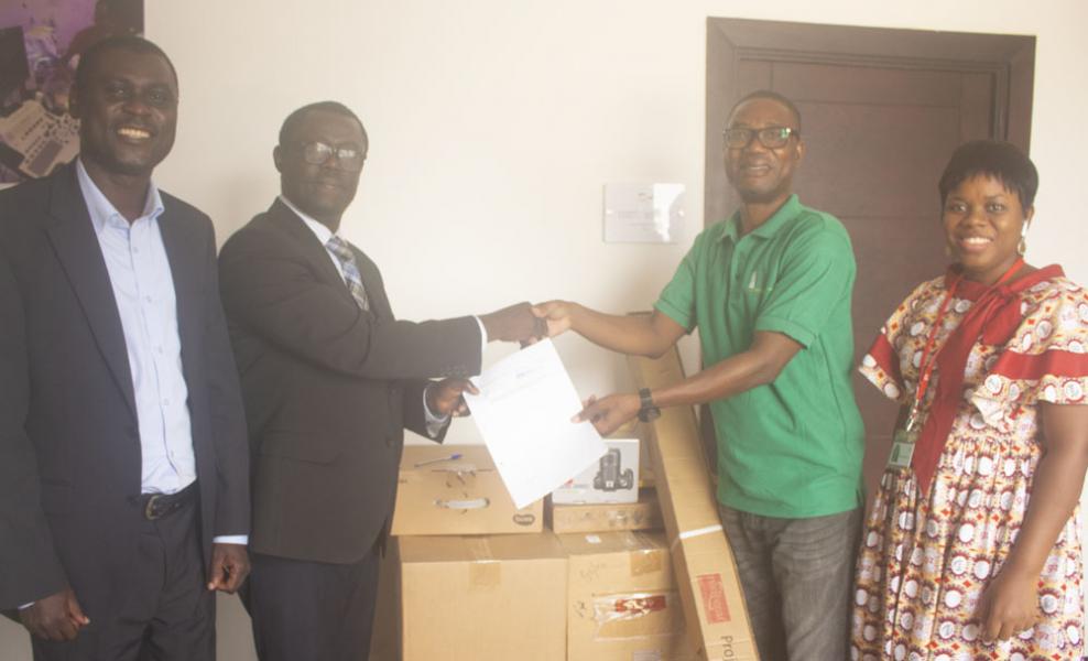 Dr Ainooson receives IT equipments from GIZ